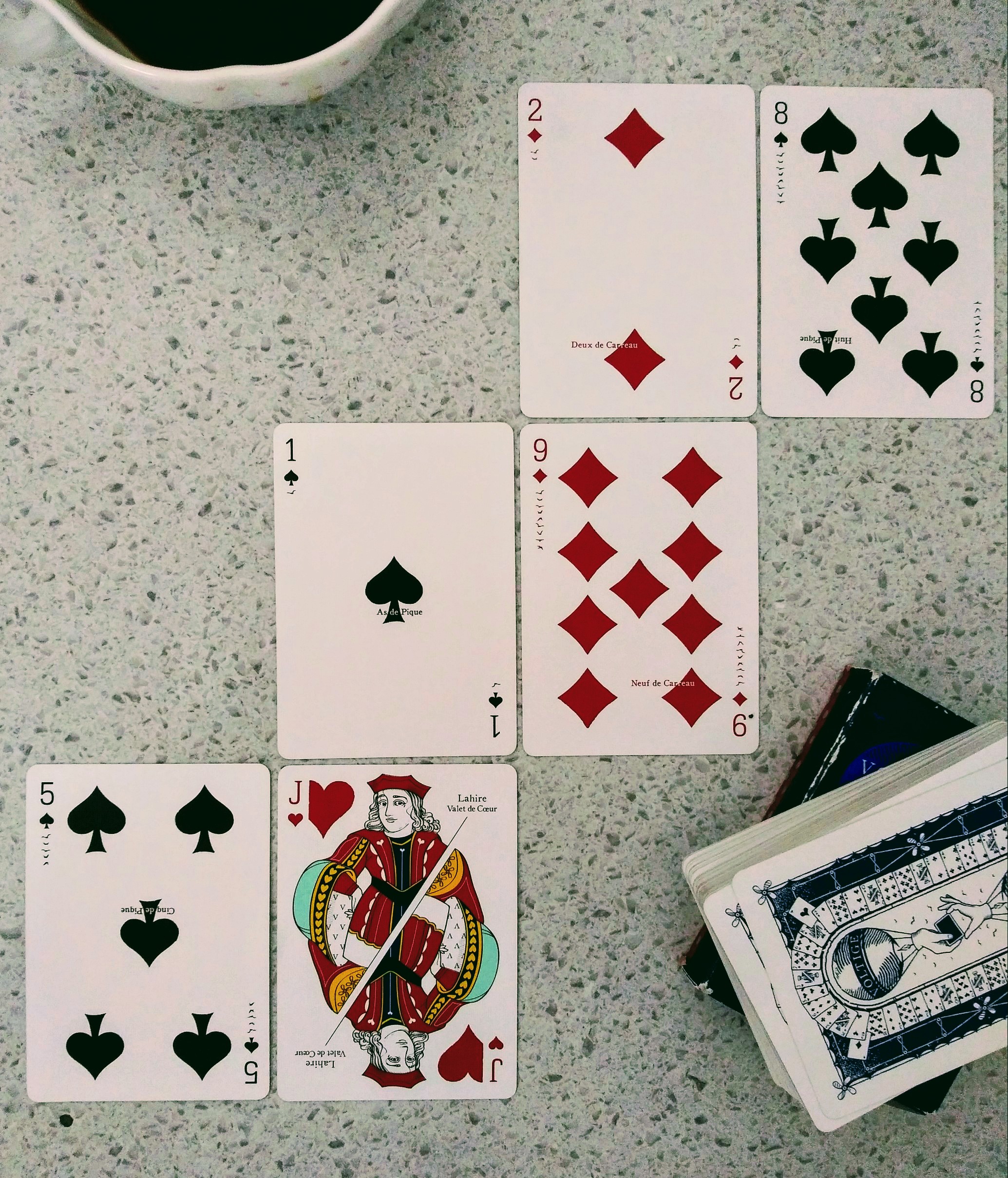Voltige Playing Cards designed by Henri deSaint Julien & Jacques Denain, published by D&D Playing Card Company.